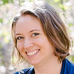 Smiling woman in a blue shirt